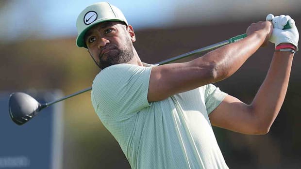 Tony Finau hits his tee shot on the 14th hole during the final round of the Farmers Insurance Open at Torrey Pines Municipal Golf Course.